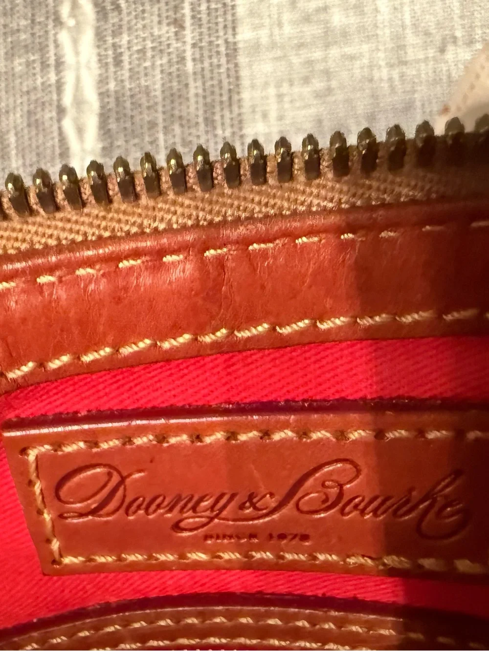 Dooney & Bourke Cream Ostrich-Texture Zip Wallet